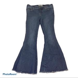 FREE PEOPLE FLARES MID WASH SHORT